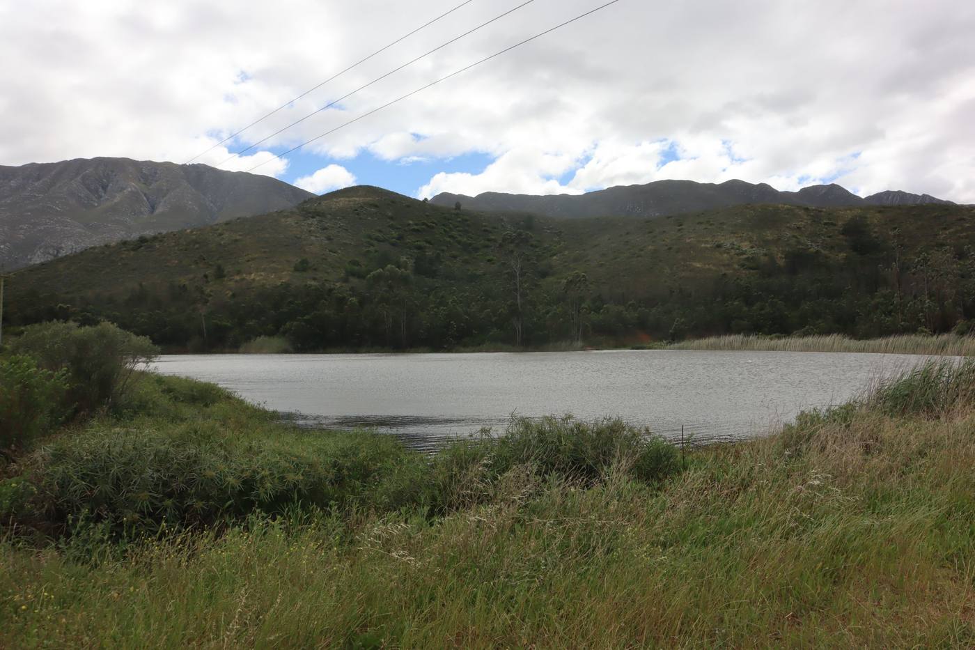 One of the two large dams, below wooded hills
