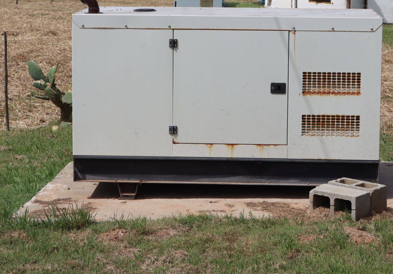 The standby generator on its concrete slab