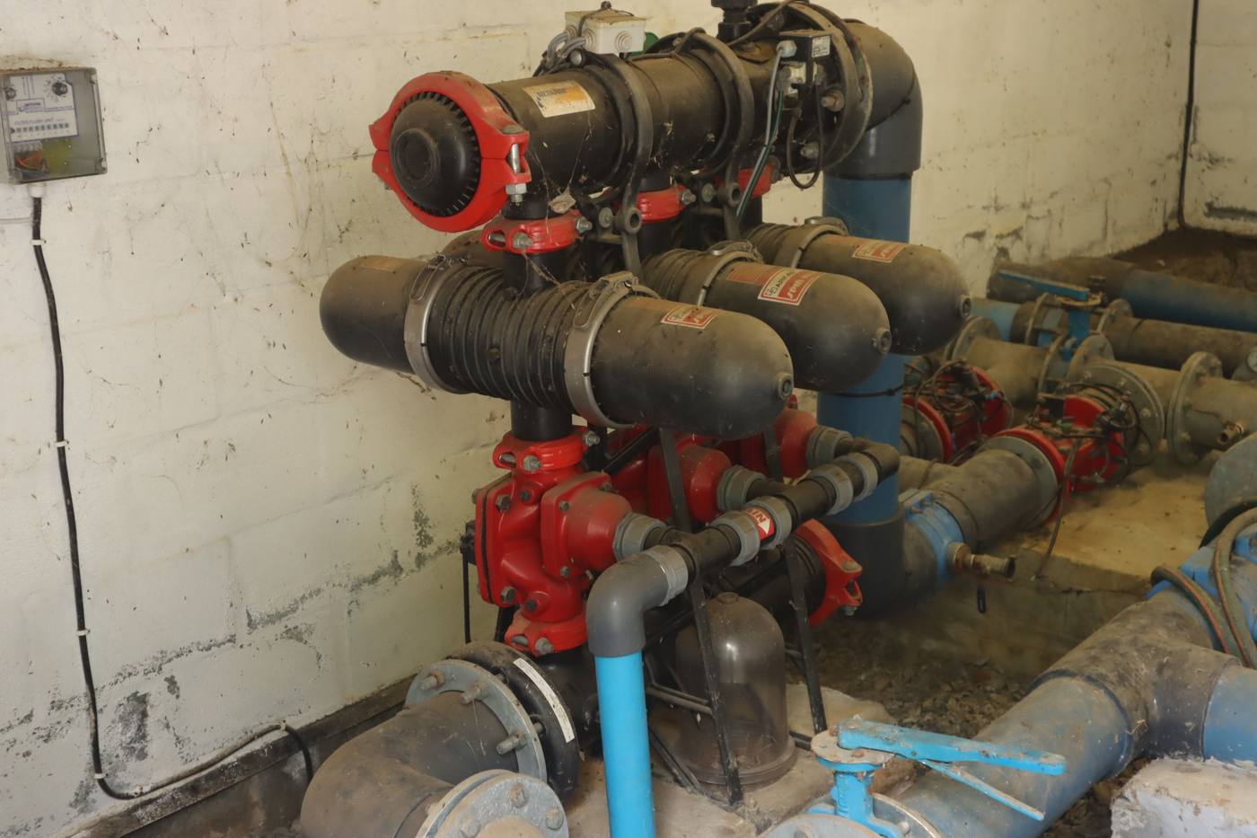 Irrigation filters and valves inside a pump house